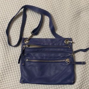 Roots crossbody 3 compartments pouch/bag.
